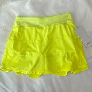 NWT Lululemon neon yellow, Pace Rival MR Skirt *long. Built in biker shorts.